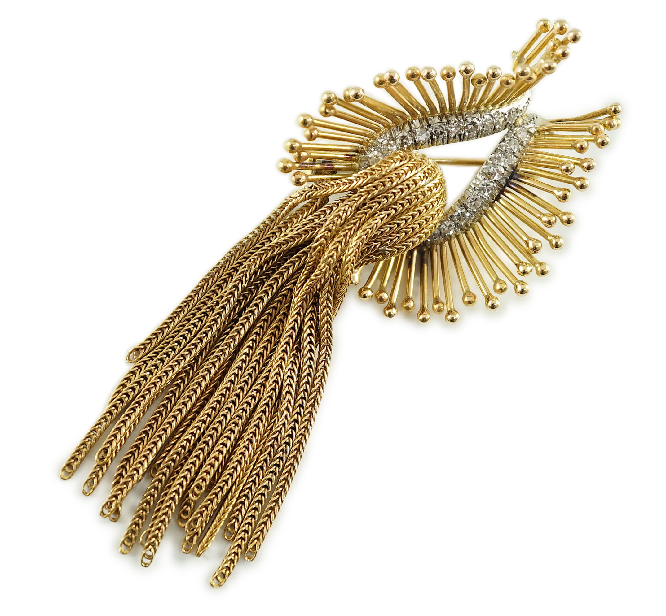 A late 20th century stylish continental gold and diamond cluster set tassel brooch